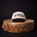 SOVRGN MONOGRAM CAP — DISTRESSED STONE BONE/BLACK