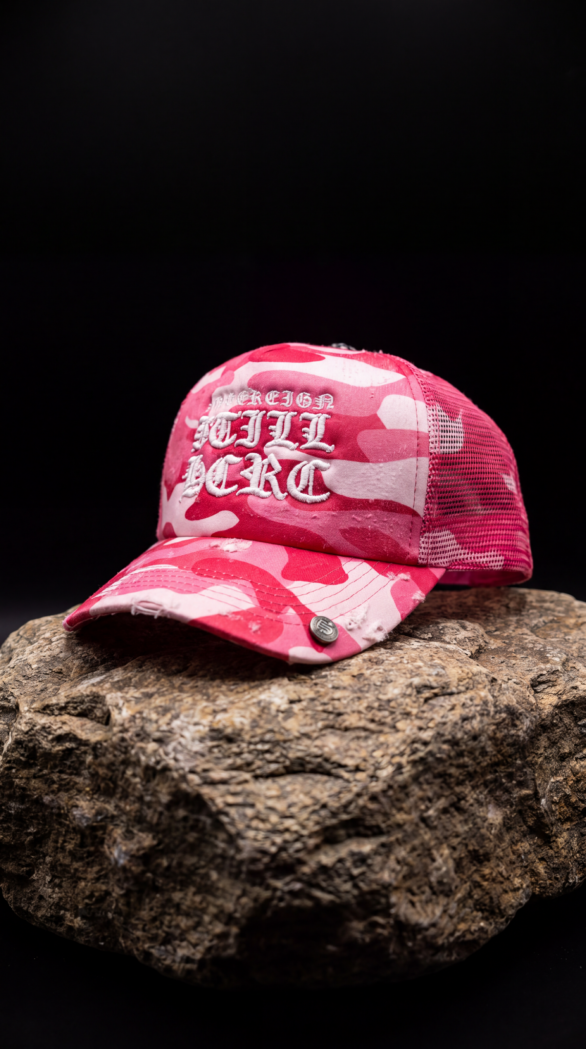 STILL HERE CAMO TRUCKER — DISTRESSED PINK