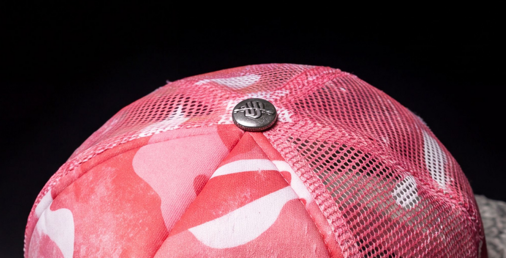 STILL HERE CAMO TRUCKER — DISTRESSED PINK